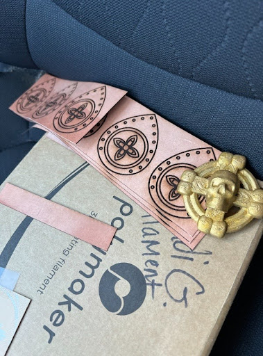 A laser engraved leather belt and 3d printed belt buckle